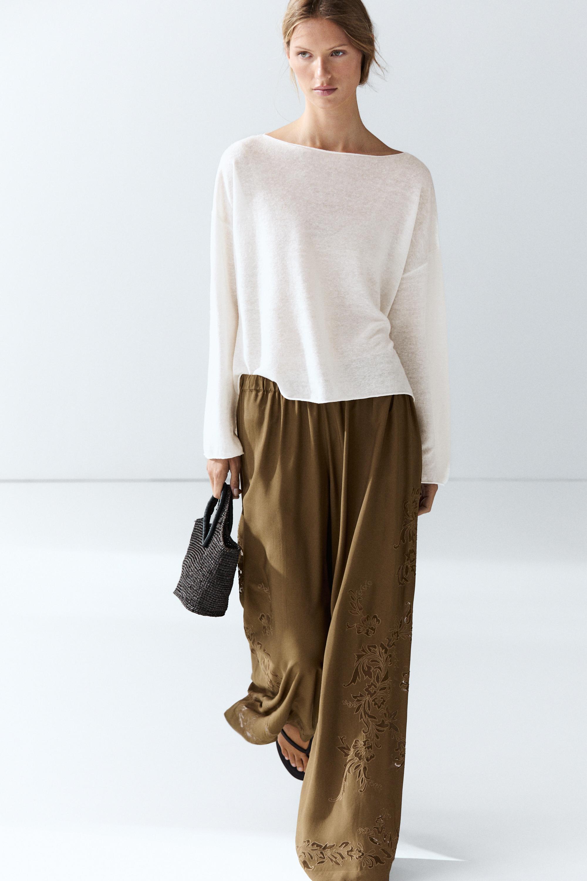 Flowing wide-leg pants with embroidery details